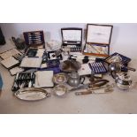 A quantity of silver plate, including flatware in cases