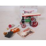 A Mamod steam tractor, in original box, 10" long