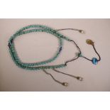 A long string of turquoise mala beads, 72" long