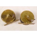 Two small vintage brass trout fishing reels, 2" diameter