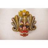 A vintage Sri Lankan Maha Kola mask, with polychrome decoration, probably first half of the C20th,
