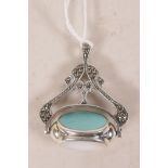 A Sterling silver pendant in the Art Nouveau style, set with moonstone, onyx and turquoise style