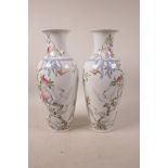 A pair of Chinese polychrome porcelain vases with peach tree decoration, 6 character mark to base,