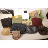 A collection of vintage handbags, mostly mid C20th