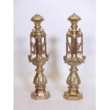 A pair of gilt brass lamps, 23" high