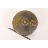 C. Farlow and Co. London, a brass trout fishing reel, c.1900, 2½" diameter, handle A/F