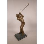 A bronzed composition limited edition golf trophy, 14½", 45/150
