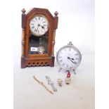 Four ladies' wristwatches, a battery operated mantel clock, 6" high, and an early C20th walnut cased