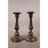 A pair of Sheffield silver plated candlesticks of lobed form, 9½" high