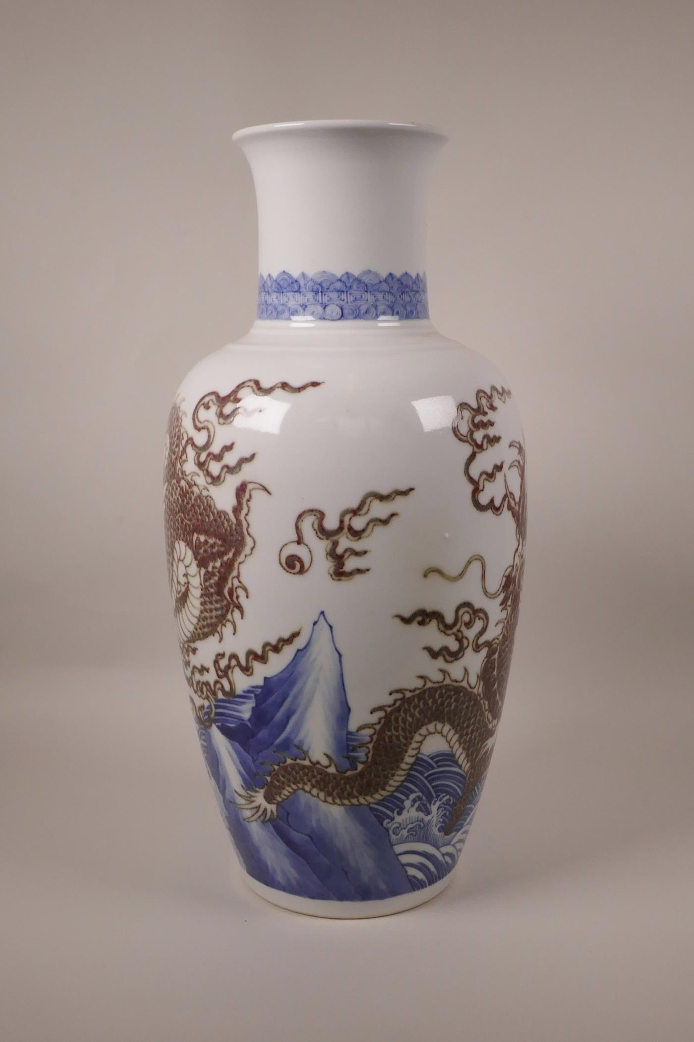 A large Chinese blue and white porcelain vase decorated with a red dragon chasing the flaming pearl, - Image 8 of 10