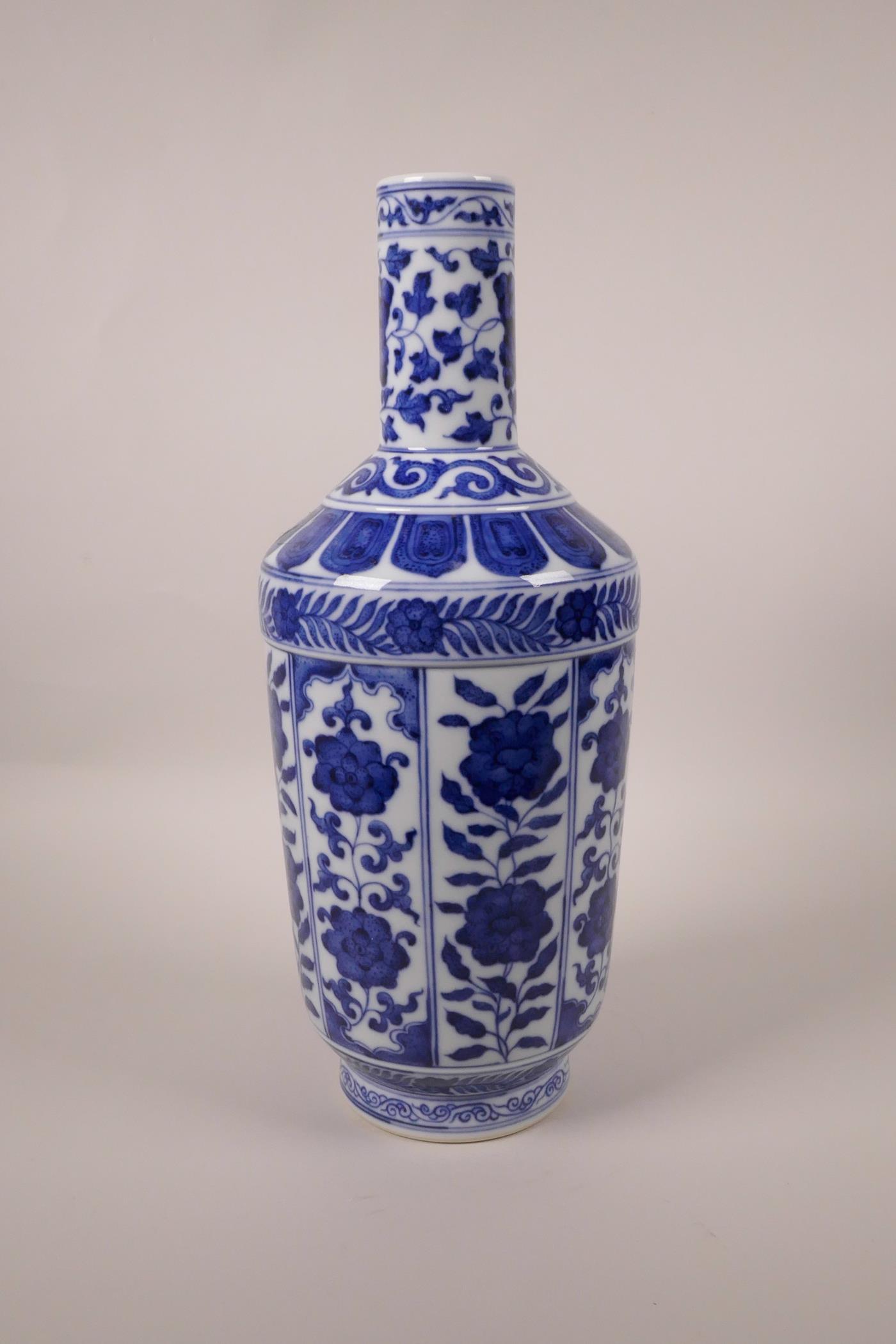 A Chinese blue and white porcelain vase with decorative floral panels, seal mark to base, 13½" high - Image 2 of 8