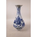 A Chinese blue and white pottery pear shaped vase of octagonal form decorated with warriors on