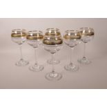 A set of six wine glasses with gilt wreath decoration, 7" high