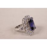 An impressive 925 silver, cubic zirconium and blue stone Princess Diana dress ring, approximate size