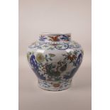 A Chinese doucai pottery jardiniere decorated with kylin and fo dogs, 6 character mark to side,