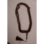 A string of kuka prayer beads, 61" long