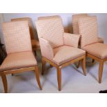 A set of six (four and two) oak framed John Lewis dining chairs, raised on sabre supports, in good