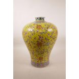 A Chinese yellow ground porcelain meiping vase decorated with bats, peaches and auspicious