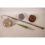 Fishing equipment, a long gaff with cord bound handle, 26" long, a vintage wooden reel, 4" diameter,