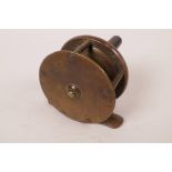 A C19th Army and Navy brass trout fishing reel, 2½" diameter