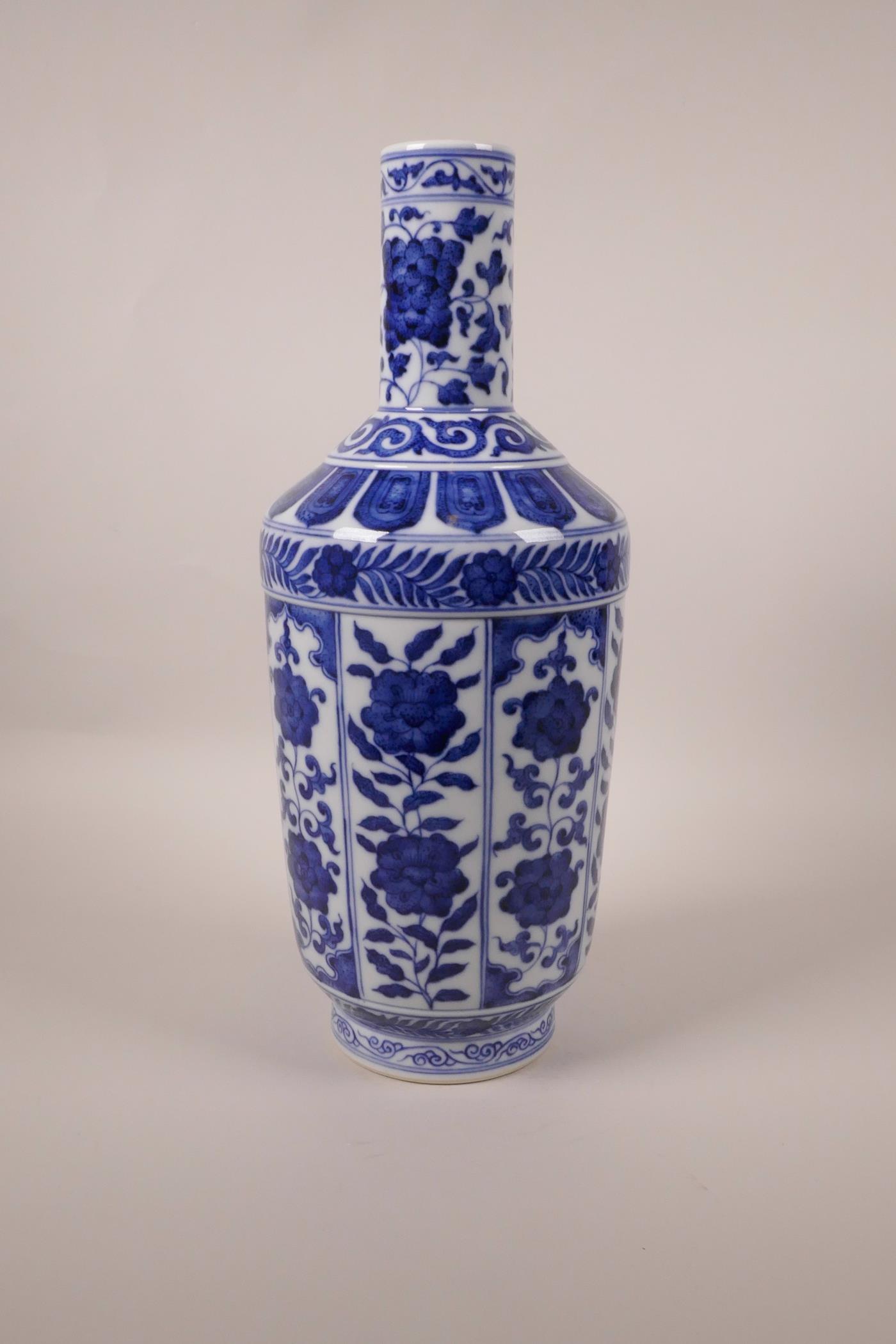 A Chinese blue and white porcelain vase with decorative floral panels, seal mark to base, 13½" high - Image 3 of 8