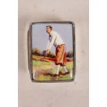 A 925 silver pill box, the lid decorated with a cold enamel plaque depicting a golfer, 1½" x 1"