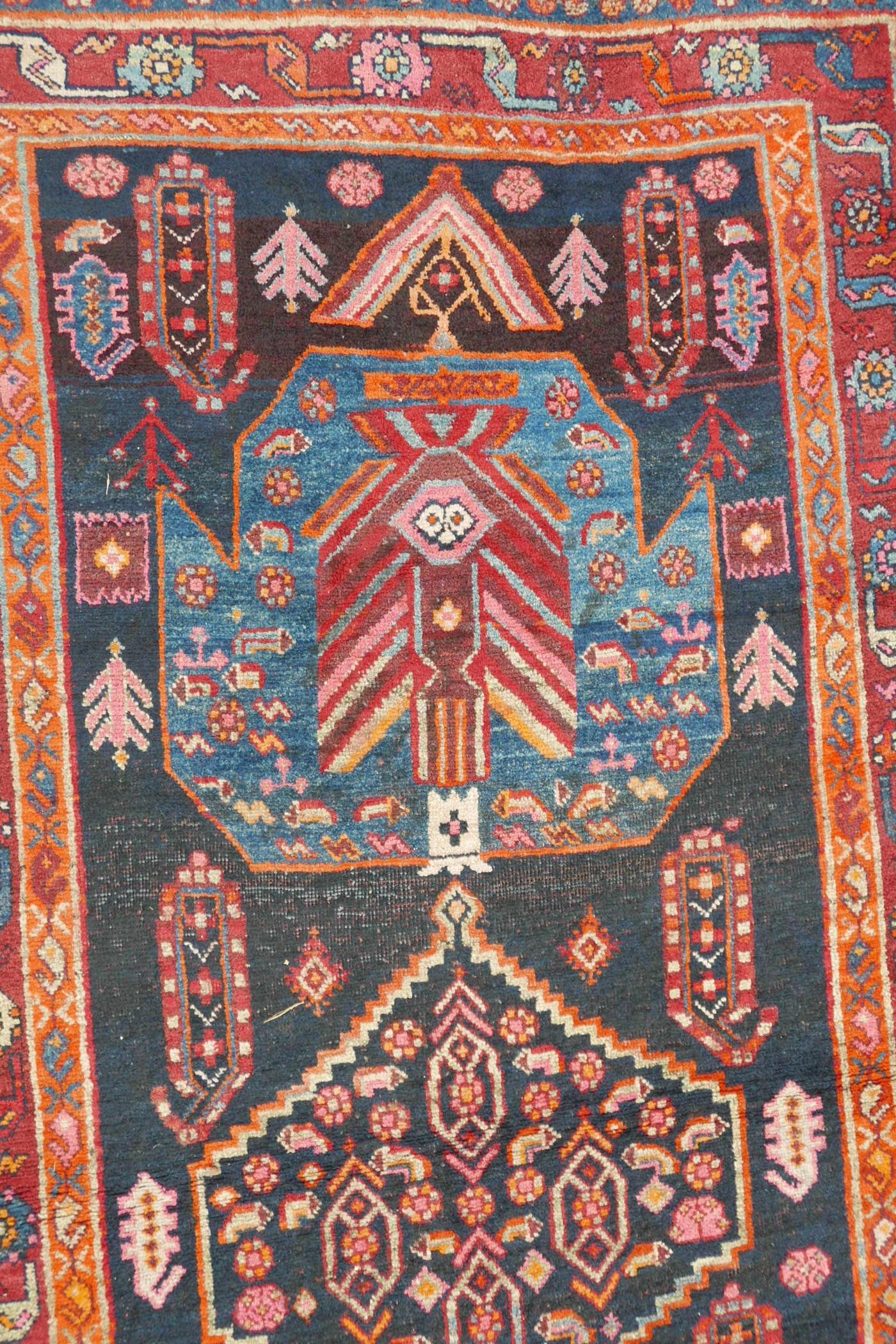 A red and blue ground Persian wool runner decorated with stylised birds and medallions, 46½" x 98" - Image 7 of 12