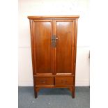 A C19th Chinese elm marriage cabinet, fitted with drawers, 41" x 23" x 73½"