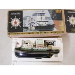 A Texaco 'Fire Chief' tugboat bank, 2000 Millenium edition, 9" long, in original packaging