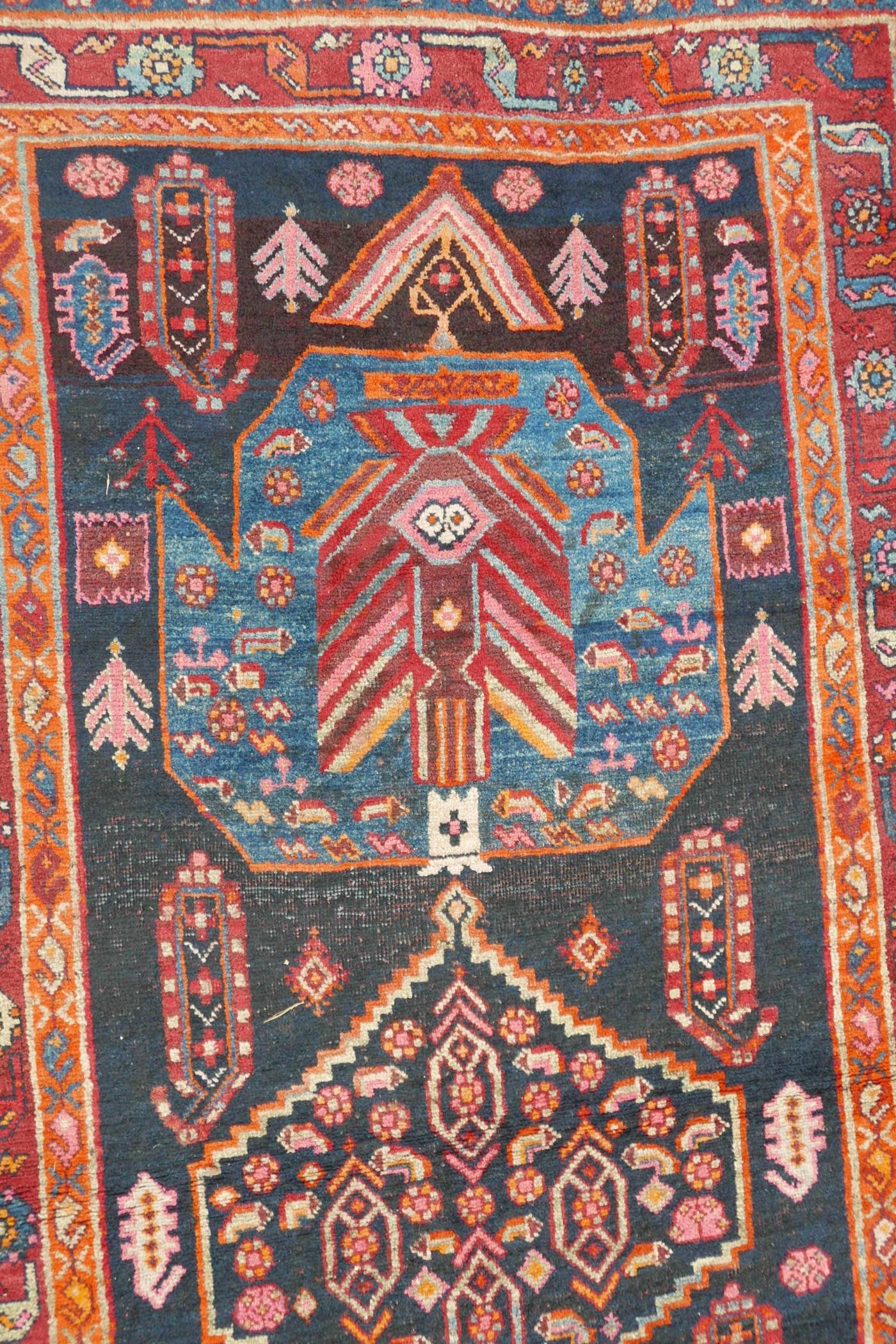 A red and blue ground Persian wool runner decorated with stylised birds and medallions, 46½" x 98" - Image 8 of 12