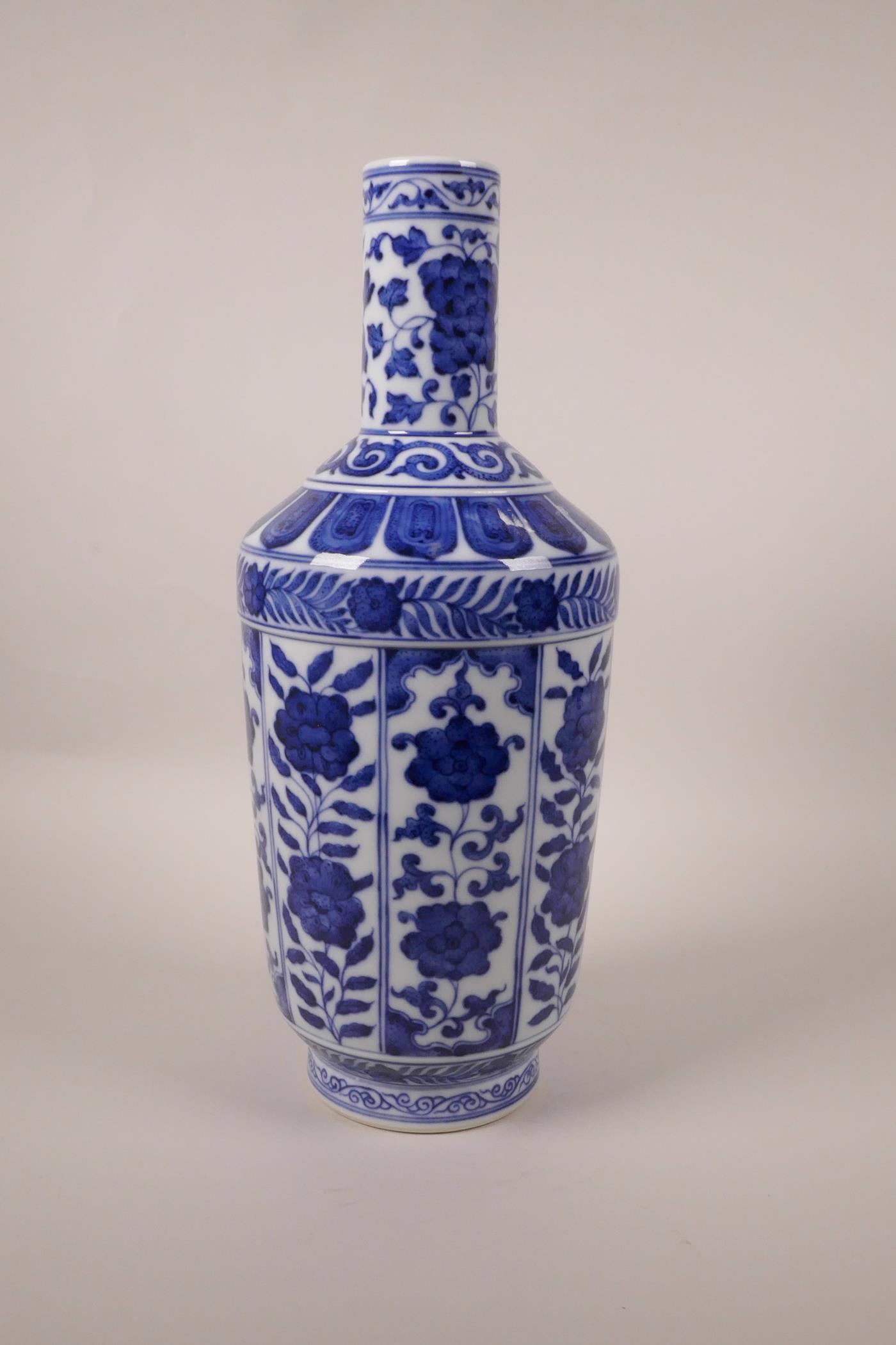 A Chinese blue and white porcelain vase with decorative floral panels, seal mark to base, 13½" high - Image 6 of 8