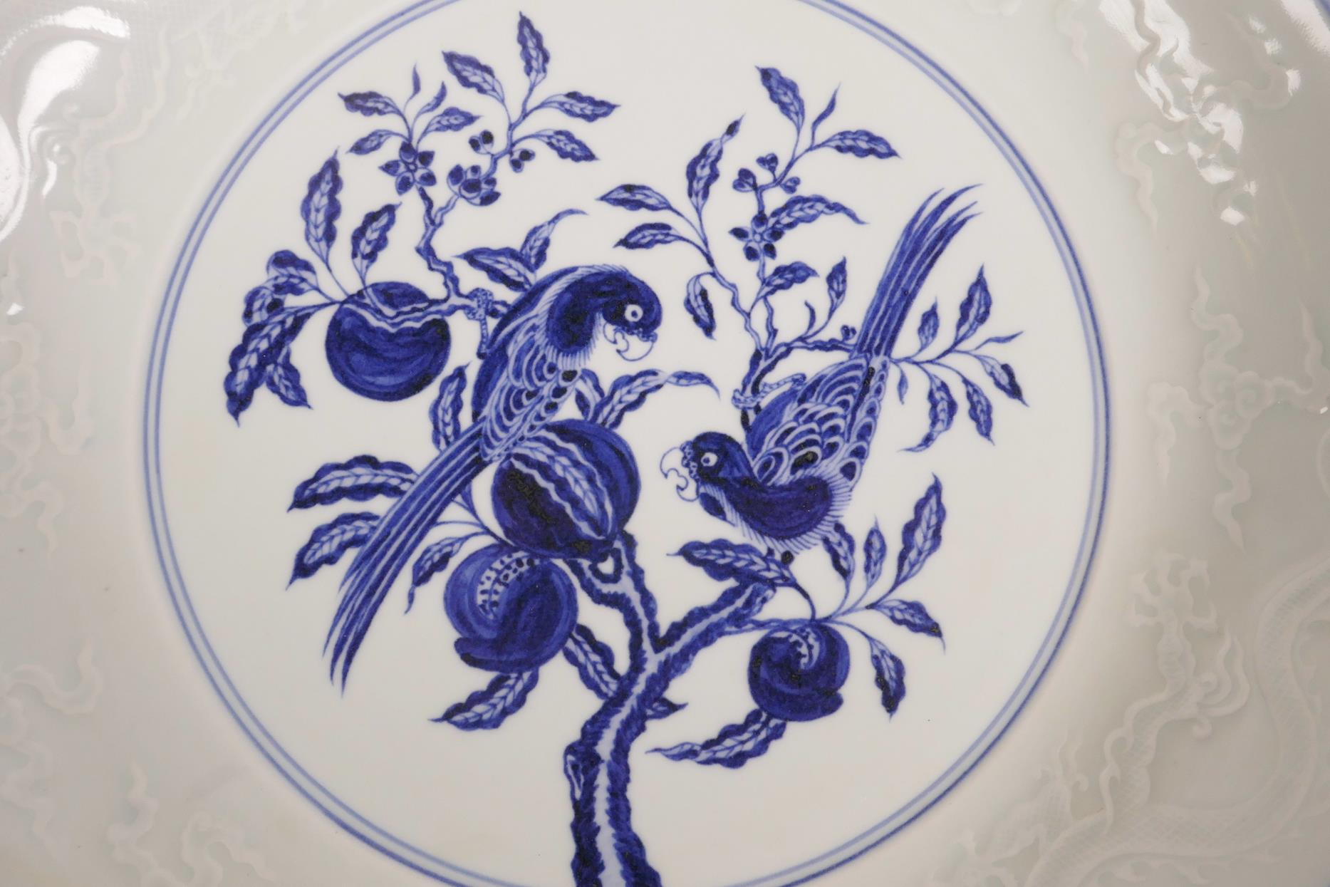 A large Chinese blue and white pottery charger decorated with two birds perched on a pomegranate - Image 4 of 8