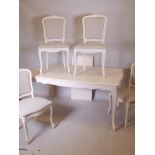 A Laura Ashley Provencale draw-leaf dining table and four matching chairs, 38" x 63" x 71" extended