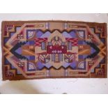 An Art Deco Bauhaus style woollen rug, 50" x 27", A/F