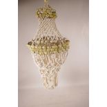 A shell Empire style tiered lamp shade, 11" diameter