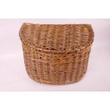 A vintage woven fishing basket/creel, 13" wide