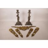 A pair of French spelter figural candlesticks, together with five pieces of brass ormolu mounts,