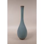 A Chinese Jun kiln glazed pottery vase with a slender neck, 13" high