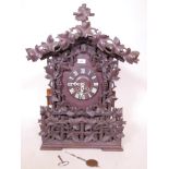 A good C19th Black Forest carved walnut and beech cuckoo bracket clock, bellows good, appears