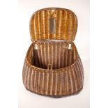An antique woven fishing basket (creel), 13" wide