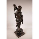 A Chinese carved wood figure of a bearded Immortal, A/F losses, 21½" high