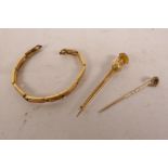 A 9ct gold extender bracelet A/F, a 15ct gold brooch with a 9ct gold pin, set with seed pearls and a