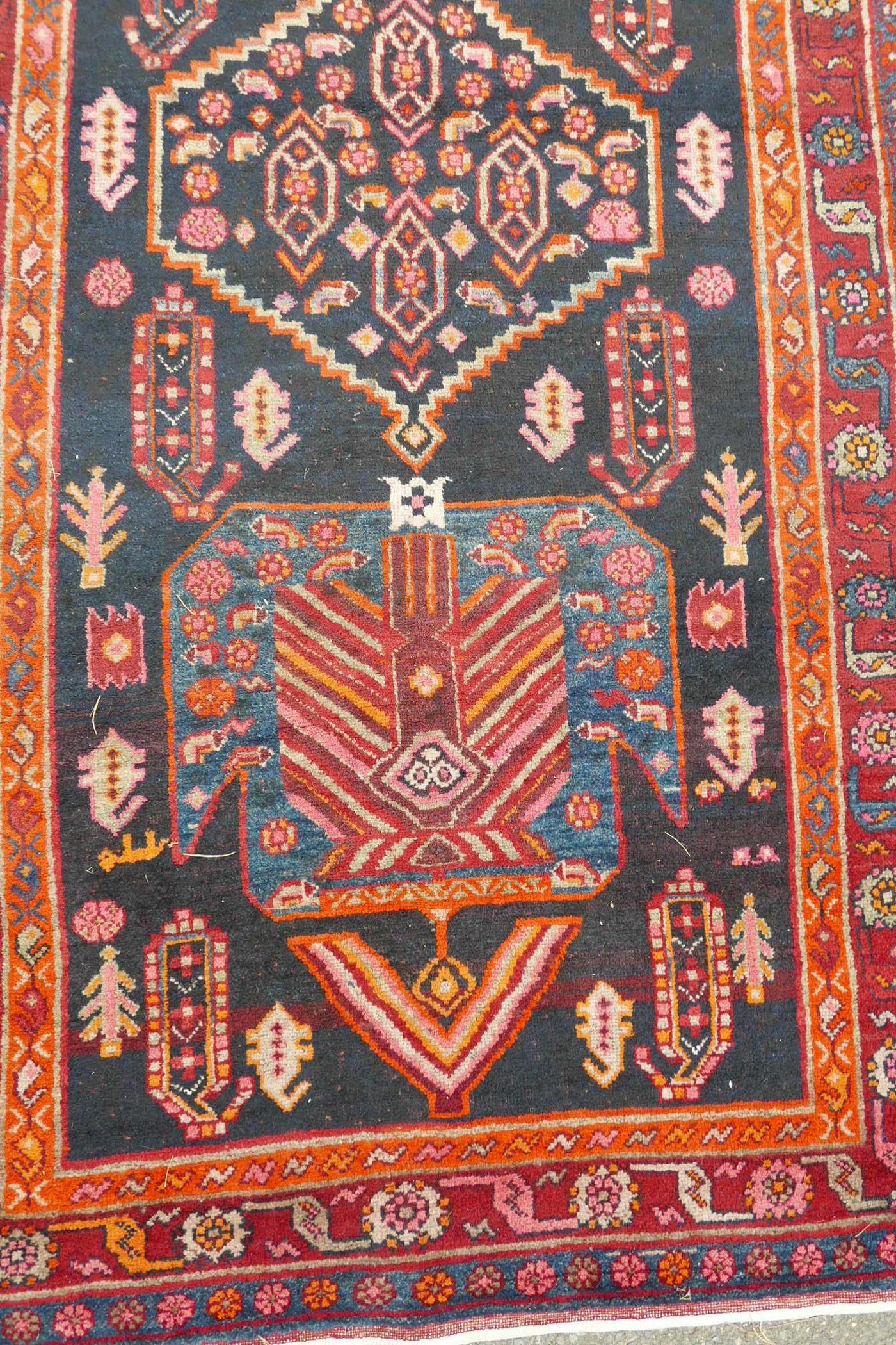 A red and blue ground Persian wool runner decorated with stylised birds and medallions, 46½" x 98" - Image 4 of 12