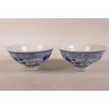 A pair of Chinese blue and white porcelain footed bowls with floral decoration, 3½" diameter