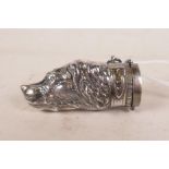 A silver plated vesta case in the form of a dog's head, 2½" long