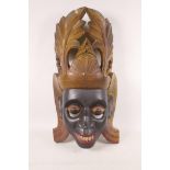 A vintage Sri Lankan Kolam mask, with polychrome decoration, probably first half C20th, 19" high