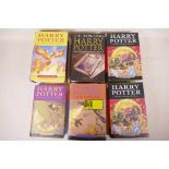 Six volumes, Harry Potter books by JK Rowling, 'The Goblet of Fire', 'The Half Blood Prince', 'The