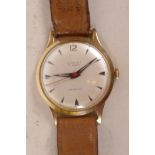 A gentleman's 9ct gold cased chalet wristwatch on leather strap
