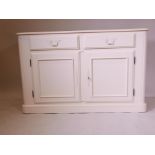 A Laura Ashley Provencale sideboard/buffet with two drawers over two cupboards, 52" x 16" x 34"