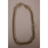 A Chinese white metal chainlink necklace with dragon head decoration to ends, 24" long